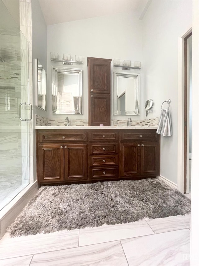 2204 Tilden Way, Bakersfield, CA 93309 - full bathroom featuring vaulted ceiling, a stall shower, and double vanity