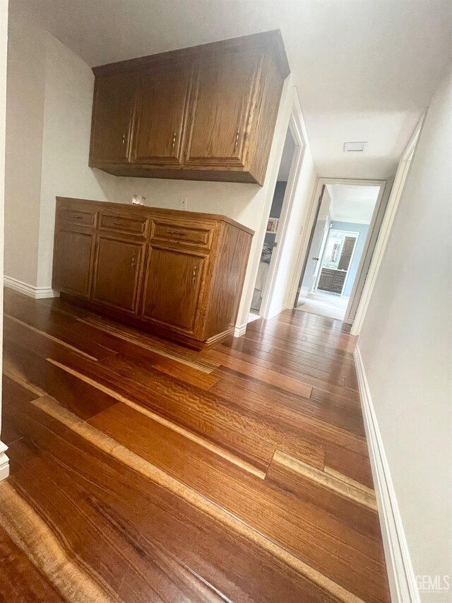 2204 Tilden Way, Bakersfield, CA 93309 - bar with dark wood finished floors and baseboards