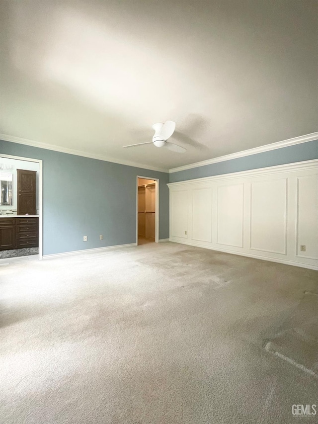 2204 Tilden Way, Bakersfield, CA 93309 - unfurnished bedroom with crown molding, light colored carpet, connected bathroom, ceiling fan, and baseboards
