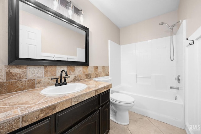 full bath featuring toilet, tile patterned flooring, bathtub / shower combination, and vanity