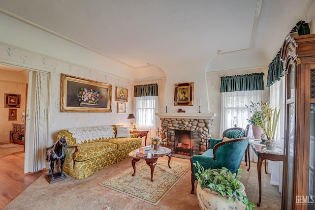 living room featuring a fireplace