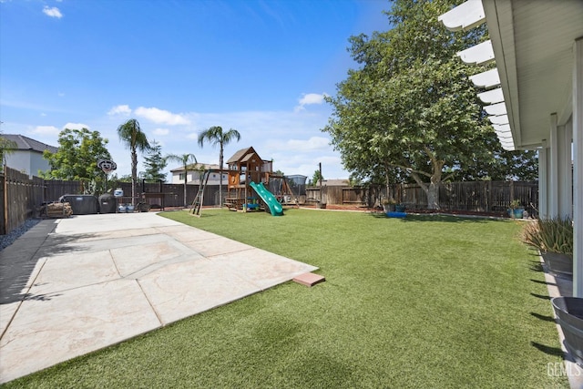 5437 White Wheat Ave, Bakersfield, CA 93313 - view of yard featuring a playground and a patio