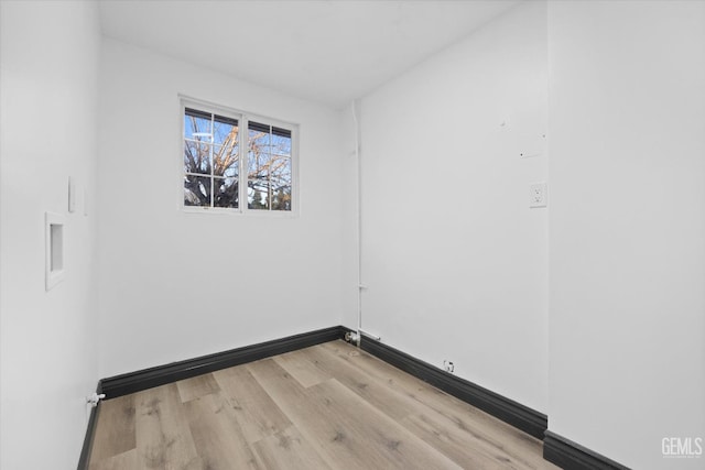 unfurnished room featuring light hardwood / wood-style flooring