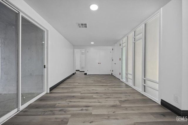 hall featuring light hardwood / wood-style floors