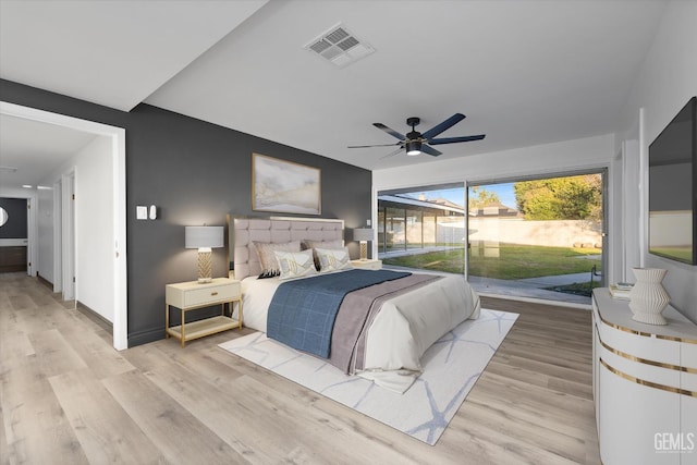 bedroom featuring ceiling fan, access to exterior, and light wood-type flooring