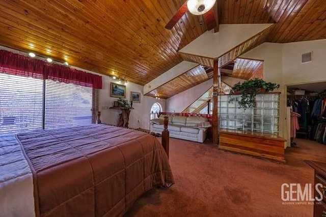 bedroom featuring carpet, lofted ceiling with beams, and wooden ceiling