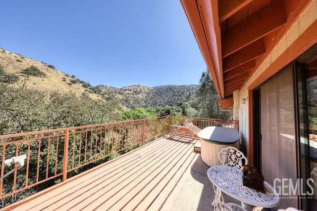 deck with a mountain view