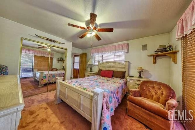 bedroom with carpet and ceiling fan