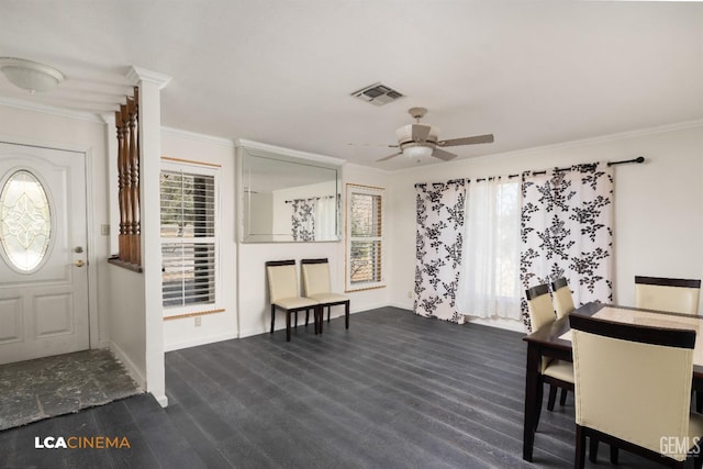 entryway with ceiling fan and crown molding