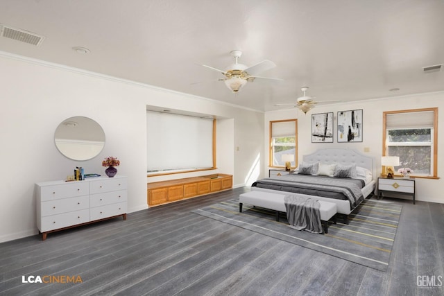 bedroom with ceiling fan and ornamental molding