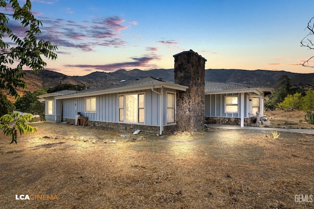 view of front facade with a mountain view