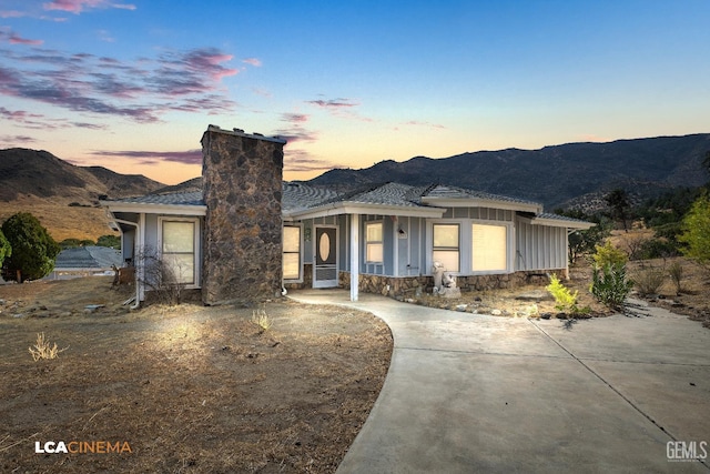 view of front of home with a mountain view