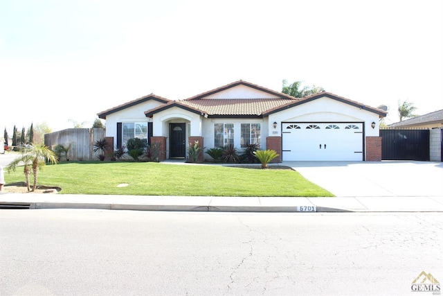 single story home with a garage and a front yard