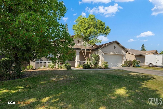 9827 Metherly Hill Rd, Bakersfield, CA 93312 - view of property hidden behind natural elements featuring an attached garage, stucco siding, and a front lawn