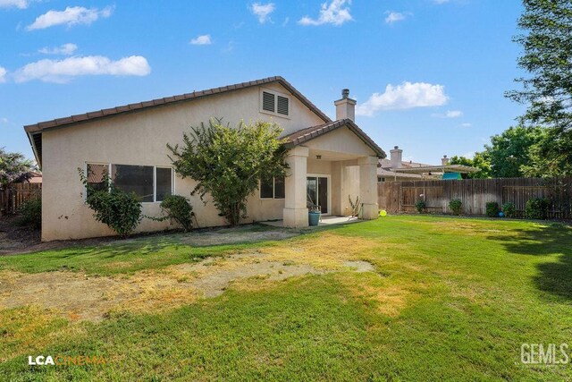 9827 Metherly Hill Rd, Bakersfield, CA 93312 - back of property featuring a chimney and stucco siding