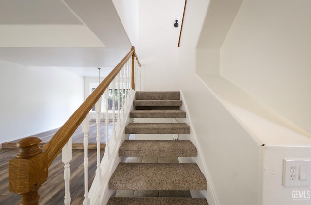 8226 Birmingham St, Bakersfield, CA 93311 - staircase featuring wood finished floors and baseboards