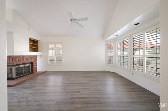 8226 Birmingham St, Bakersfield, CA 93311 - unfurnished living room featuring ceiling fan, wood finished floors, a brick fireplace, baseboards, and high vaulted ceiling