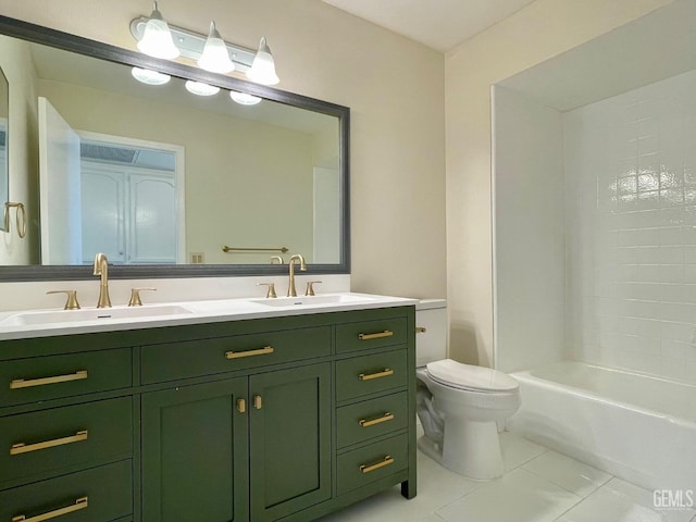 full bathroom with tile patterned floors, vanity, toilet, and  shower combination