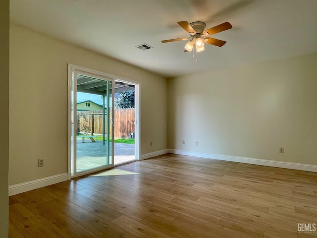 unfurnished room featuring ceiling fan and light hardwood / wood-style floors