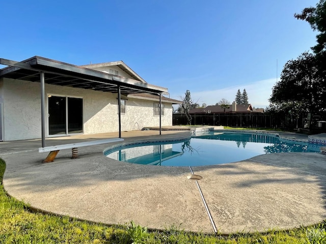 view of pool featuring a patio area