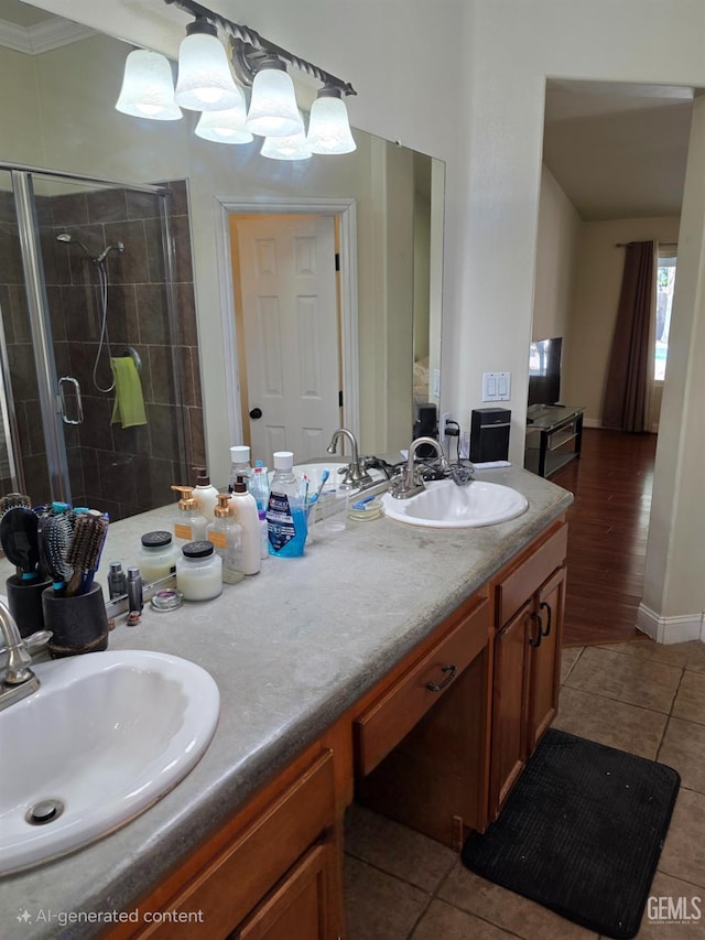 10302 Willow Bend Ct, Bakersfield, CA 93312 - full bath featuring tile patterned floors, double vanity, a stall shower, and crown molding