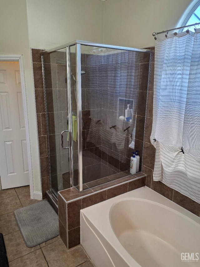 10302 Willow Bend Ct, Bakersfield, CA 93312 - bathroom with tile patterned floors, a stall shower, and a garden tub
