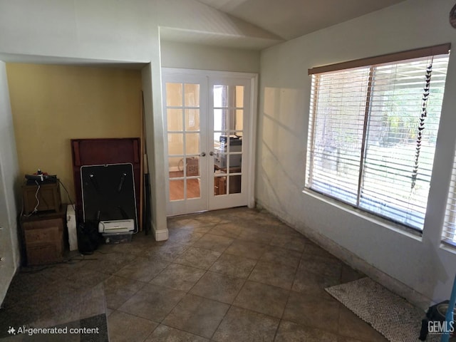10302 Willow Bend Ct, Bakersfield, CA 93312 - unfurnished living room featuring healthy amount of natural light, french doors, dark tile patterned floors, and lofted ceiling