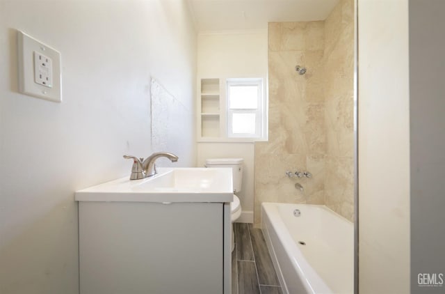 bathroom with wood tiled floor, shower / bath combination, toilet, and vanity