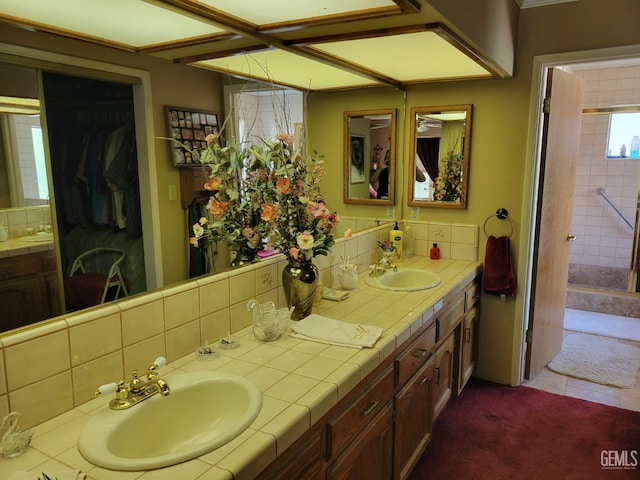 bathroom with vanity and decorative backsplash