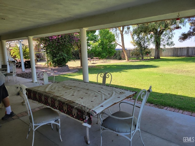 view of patio with a hot tub