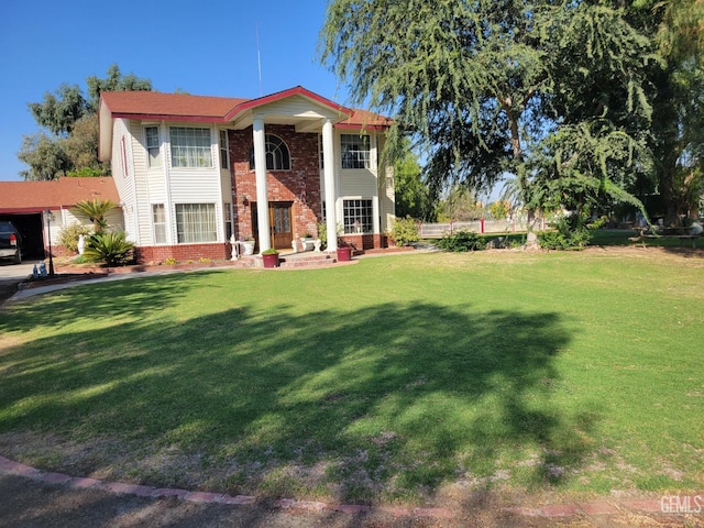 neoclassical / greek revival house with a front yard