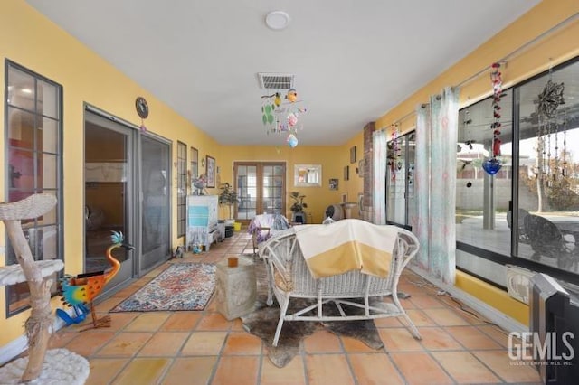 sunroom / solarium with french doors