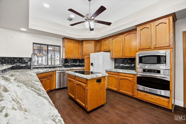 view of patio / terrace featuring ceiling fan