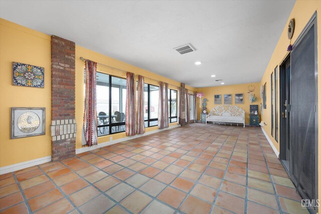 bedroom with light tile patterned flooring