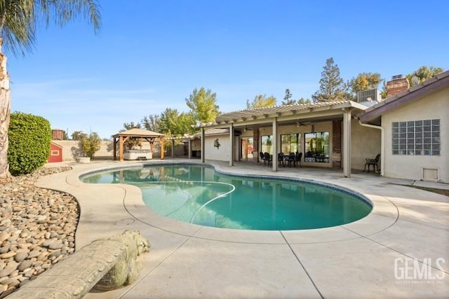 view of pool featuring a gazebo and a patio