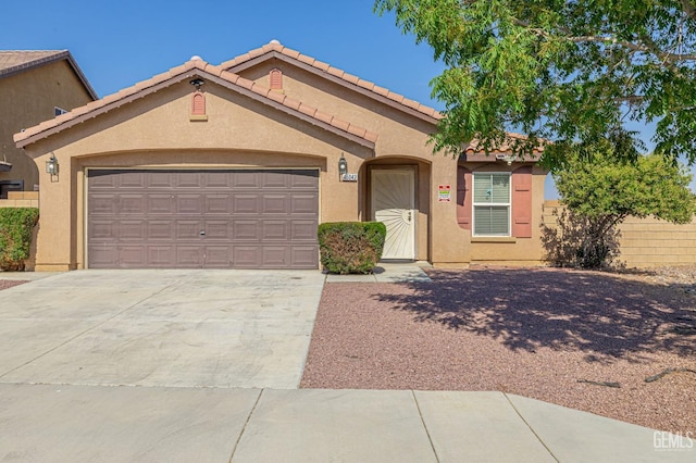 view of front of home with a garage