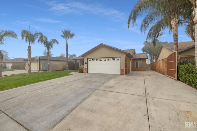 ranch-style house with a garage and a front yard