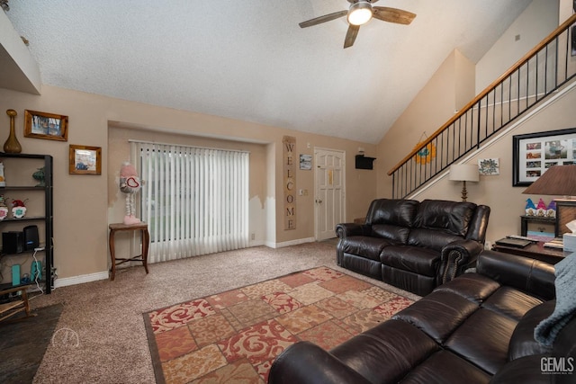 living room with vaulted ceiling, carpet, a textured ceiling, and ceiling fan