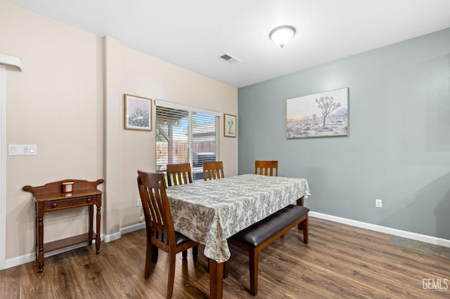 7303 Glenn Miller Ct, Bakersfield, CA 93312 - dining area with visible vents, baseboards, and wood finished floors