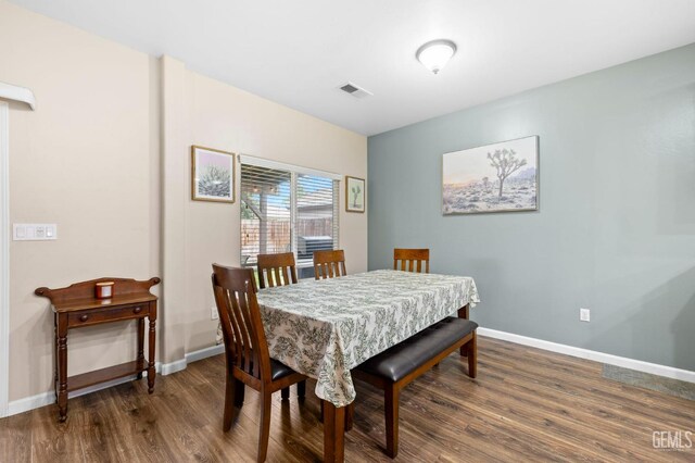 7303 Glenn Miller Ct, Bakersfield, CA 93312 - dining area featuring visible vents, baseboards, and wood finished floors