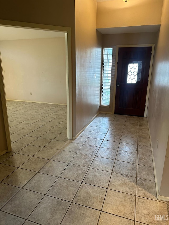 view of tiled foyer entrance