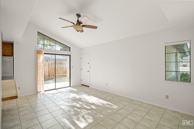 7205 Bandolero Way, Bakersfield, CA 93308 - empty room with a ceiling fan, baseboards, light tile patterned flooring, and high vaulted ceiling