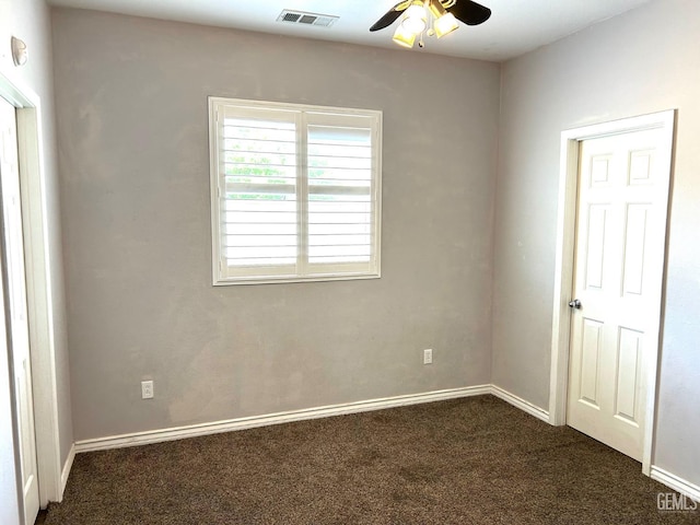10315 Paradiso Way, Bakersfield, CA 93306 - empty room with dark colored carpet, a ceiling fan, and baseboards