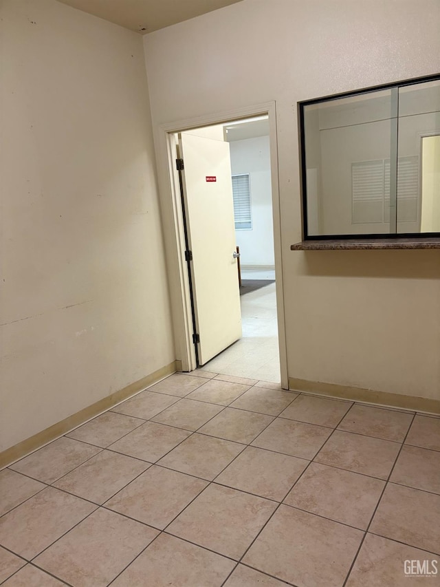 267 Cedar Ave, Earlimart, CA 93219 - unfurnished room featuring light tile patterned floors