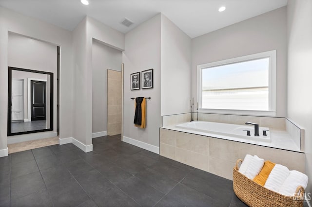 bathroom featuring tile patterned floors and plus walk in shower