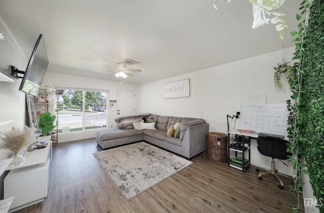 2513 Pinon Springs Cir, Bakersfield, CA 93309 - living room with ceiling fan, wood finished floors, and visible vents