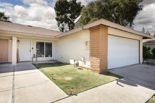 2513 Pinon Springs Cir, Bakersfield, CA 93309 - view of property exterior featuring an attached garage, a lawn, stucco siding, and driveway
