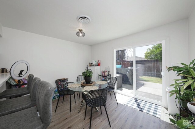 2513 Pinon Springs Cir, Bakersfield, CA 93309 - dining room with wood finished floors and visible vents