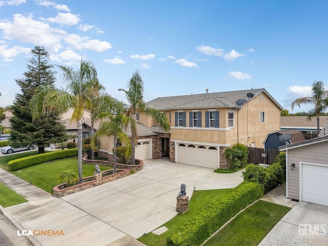 11703 Revolution Rd, Bakersfield, CA 93312 - view of front of house featuring stucco siding, concrete driveway, stone siding, and an attached garage