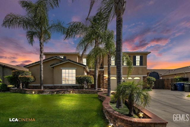 11703 Revolution Rd, Bakersfield, CA 93312 - view of front of home with stucco siding and concrete driveway